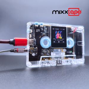 Mixxtape, the cassette reinvented as a high-resolution music player, being shown with a USB-C cable and wired headphones plugged in