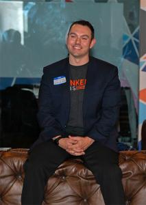 Chris Irving seated during his launch of the Bunker Labs Boston chapter.
