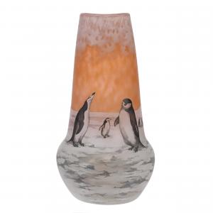 Extremely rare French cameo art glass vase marked Daum Nancy, 9 ¾ inches tall, with orange ground and a fantastic cameo cut and enamel penguin scenic décor ($17,000).