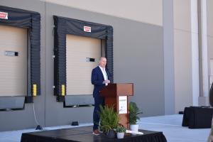 Mark Militzer, Regional Vice President at NorthPoint Development Speaking at the Ribbon Cutting Event