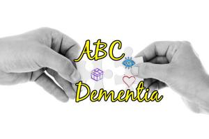 ABC Dementia Logo depicting hands putting together puzzle pieces representing an eye, a heart, and a gift.