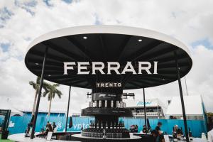 A circular bar that says Ferrari