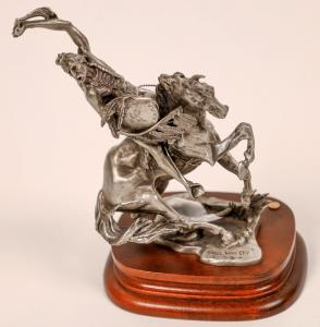 Michael Boyett pewter sculpture titled Sioux War Cry, from the Chilmark Legacy of Courage Collection honoring the American Indian, 4 ½ inches tall on a wooden base (est. $90-$150).