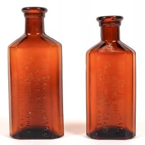 One lot of two amber drug bottles from Leadville, Colorado (The Davis Drug Company and The Rexall Store), circa 1900, both bottles clean with no chips (est. $200-$400).