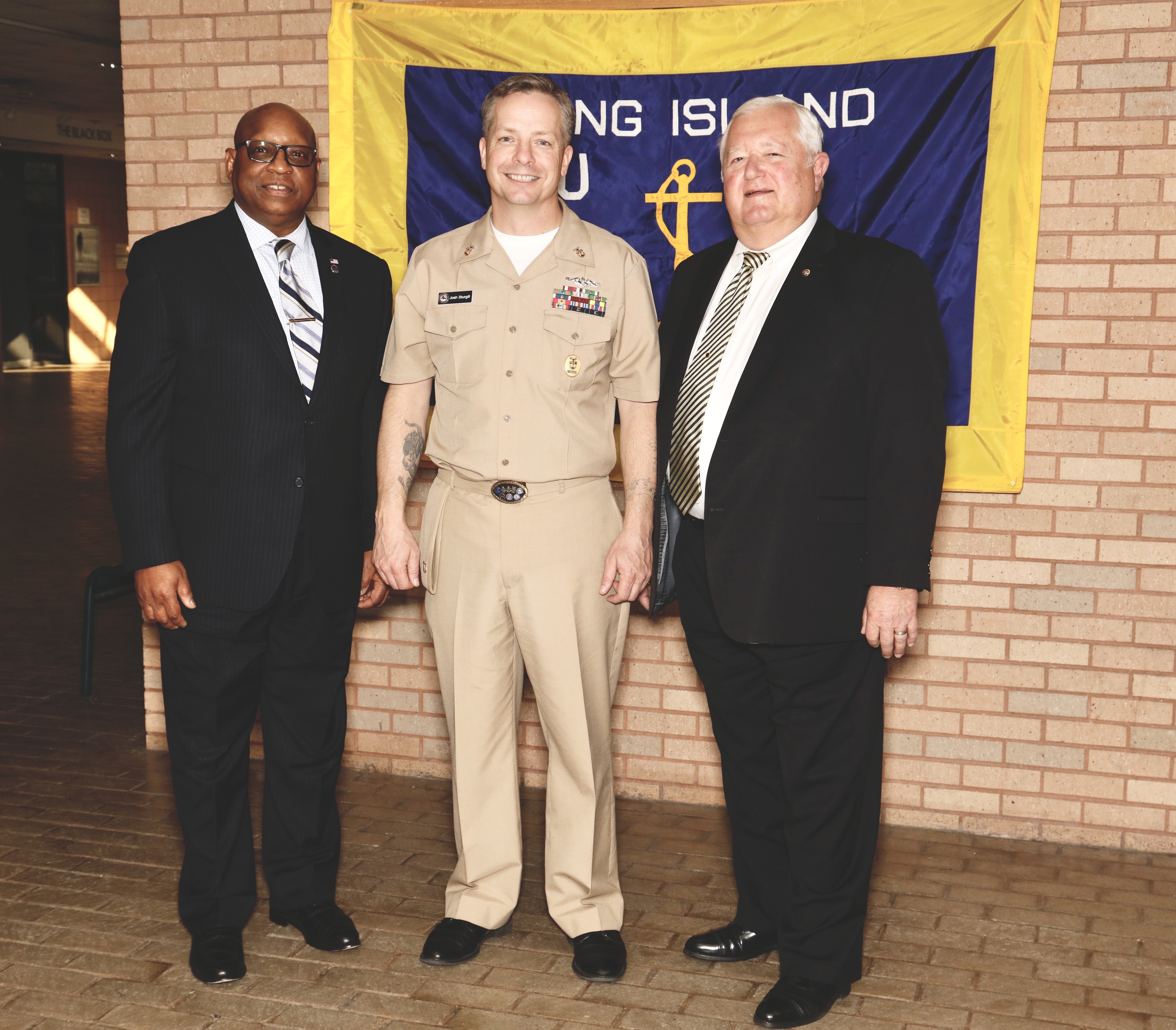 Three men at  LI Council Navy League of the US event, Owen Watford, CMC Josh Sturgill, Walter A. Poggi Retlif Testing Laboratories
