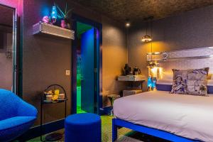 Space-age bedroom design by artist and designer Henry Chebaane, retro-futuristic style,  science-fiction, silver and blue interiors.