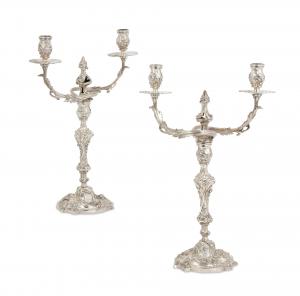 Pair of George III sterling silver two light candelabra (William Tuite, London, 1764) (est. $10,000-$20,000).