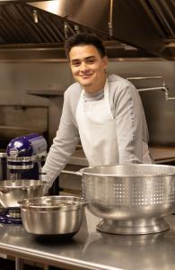 Julian Sanchez, La Follette junior graduating early thanks to the support of the TEENWorks Program at Goodman Community Center. With support from Goodman staff, he now leads a middle school cooking class and helps drive the menu for Goodman’s Good Works C