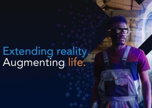 Text to the left side of image reading ' Extending reality. Augmenting life'. A human worker on the right hand side wearing the ARGO Smartglasses.