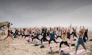 Beachfront yoga during First Light Festival 2022