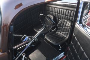 The coupe's interior is spartan, yet full of vintage hot rod styling and flare.