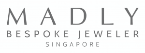 The MADLY logo is a simple and clean text logo that states 'MADLY Bespoke Jeweler Singapore'