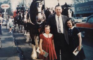 In 1959 The Budweiser Clydesdales paid a visit to Chevy Chase Inn. Pictured is Ed Whitlock (owner at the time) and daughters Cynthia and Judy.  Photo provided by the Whitlock Family.
