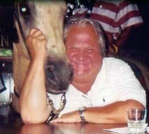 Long time Chevy Chase Inn regular Dickey Cole made a new friend with Buck on July 4th, 1988. Photo provided by Julie Perry.