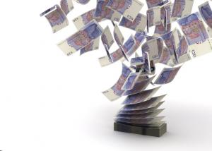 Block of bank notes flying