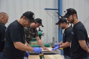 Concrete Protector Trainees learn the art of Rustic Concrete Wood