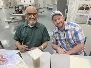 Greg (left), a current STAR participant, sits with Jon, a former STAR participant who now works as a peer recovery specialist with The Chris Atwood foundation and serves as a sponsor and mentor to Greg and others.