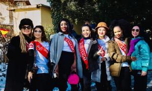 Beauty Queens from all over the world take pictures with excitement.