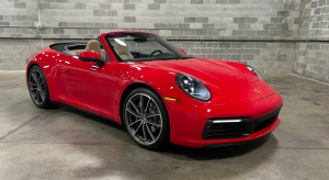 Breathtaking red Porsche 911 Convertible, available for your driving pleasure via MotorEnvy's subscription service.
