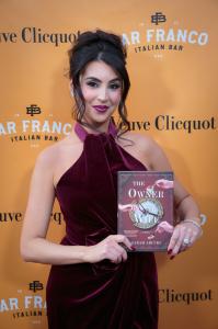 Sarah Arcuri author of "The Owner & The Wife" on the red carpet at her launch party event hosted at Fresco Da Franco in Montclair, NJ.