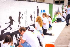 The mural stretches the length of a city block.