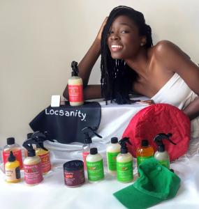 Ensie Durin Posing with Locsanity's Products