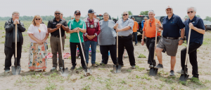 Image of Chief, Councillors, Municipal and Conservation Authority leaders holding shoves