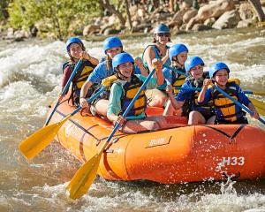 ScoutsBSA girls enjoying white water rafting