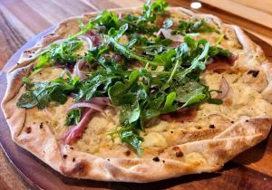 Delicious Alsatian Pizza with a range of scrumptious Toppings to choose from.