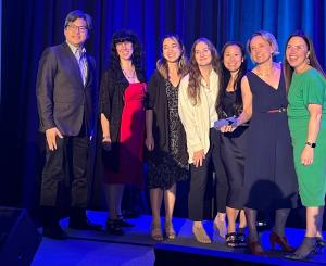CEO Alyson Gourley-Cramer, accepts national award on behalf of Monogram Communications