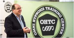 Hansruedi Wipf in front of an OMNI Hypnosis Training Class