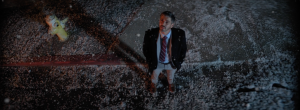 Still image of man standing in the snowfall from LITTLE WINGS, a film by Mateo Messina