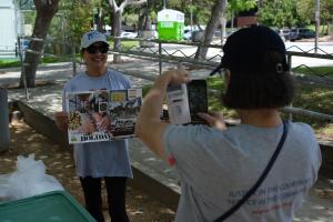 Photo of Clare|Matrix resident holding vision board. os Angeles Trial Lawyers’ Charities (LATLC) proudly sponsored a women's empowerment event with Clare|Matrix. Activities included creating vision boards.