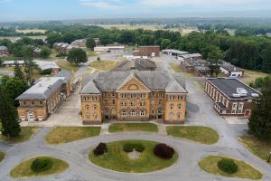 The school building is one of 75 structures on the historic Scotland Campus being sold at auction July 25-27