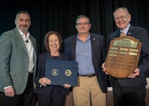 Teri Takai is presented with the 2023 Chief Harlin R. McEwen Award