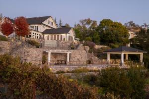 large stone wall with landscape lighting lining the steps