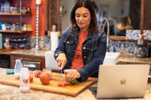 Founder of Milk Diva, Naiomi Catron, is preparing nutritious food for babies transitioning to solids.