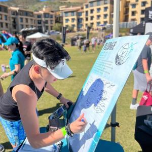 Educating youth and encouraging them to sign a drug-free pledge