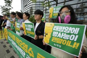Protest was held near a building which houses the Japanese Embassy in Seoul, South Korea, Friday, June 30, 2023. The letters read, "Radioactive water in ground facilities." (AP Photo/Ahn Young-joon)AP