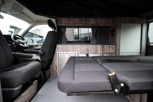 Internal shot of a T6.1 Campervan set up for night time