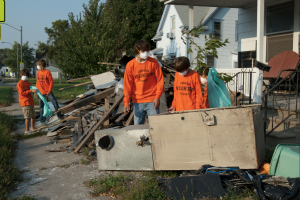 Scouts participating in flood cleanup efforts