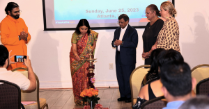 Dr. Swati Vijay Kulkarni, Consul General of India, Atlanta, USA, lighting the lamp at C20 Education Summit organized by Vibha.org