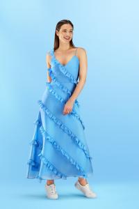 model in a blue dress shot in studio by isa aydin