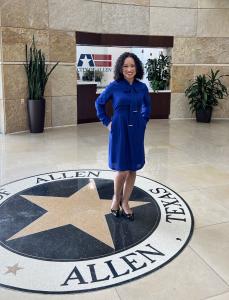 Woman standing in lobby of city of Allen building