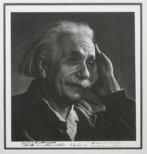 Original signed silver print photograph of Einstein, poetically inscribed and signed by him, taken in 1948 by the great portrait photographer Yousuf Karsh.