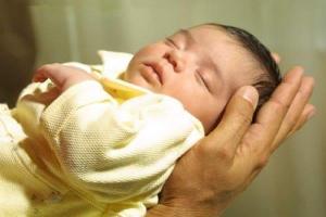 A Safe Haven for Newborns infant left safely in caring arms.