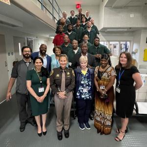 Sheriff Kincaid with Fairfax County Sheriff's Office deputies with participants in the FCSO STAR programs.