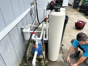swapping out well pump- Eastern water and health