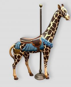 Early 20th century carved and painted carousel animals included this nicely restored, 69-inch-tall giraffe, attributed to Herschell-Spillman. It sold for $7,380. The estimate was $3,000-$5,000.