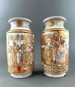 Pair of Satsuma vases, Roleau forms finely decorated with an imperial scene with various male and female figures in a palace setting, each vase 9 ¾ inches tall ($3,444, est. $1,000-$2,000).